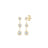 The TINY TREASURES THREE BEZEL DANGLE EARRINGS by Roberto Coin are 18K gold drop earrings with three vertically arranged, bezel-set clear gemstones—timeless jewelry for any occasion, shown on a white background.