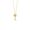 Yellow gold palm tree necklace on a white background
