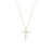 The TINY TREASURES SMALL DIAMOND CROSS NECKLACE by Roberto Coin features an 18K gold chain and a diamond-encrusted cross pendant, beautifully displayed on a white background—a dazzling, delicate piece.