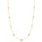 Yellow gold necklace with thirteen round diamond stations on a white background