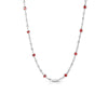 The Roberto Coin Diamonds by the Inch Diamond and Ruby Station Long Necklace showcases alternating clear diamonds and red rubies in a slim, chain-like design, presented against a white background.