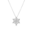 The Roberto Coin TINY TREASURES DIAMOND SNOWFLAKE NECKLACE is an 18K white gold piece featuring a delicate, diamond-adorned snowflake pendant on a fine chain, shown against a white background.