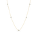 Yellow gold necklace with five small round diamond stations on a white background