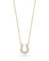 The TINY TREASURES DIAMOND HORSESHOE NECKLACE by Roberto Coin features a minimalist horseshoe pendant with sparkling diamonds, elegantly set on an 18K white gold chain.