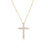 Yellow gold diamond cross necklace on a white background