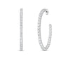 A pair of Roberto Coin THE PERFECT DIAMOND HOOP® Large Inside Outside Open Back Earrings in 18K white gold, set with round white diamonds, shown on a white background with one earring side view and the other front view.