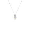 The Roberto Coin TINY TREASURES PAVE DIAMOND CHICK NECKLACE features a chick pendant encrusted with diamonds and accented with 18K gold beak and feet, hanging from a fine silver chain against a white background.
