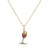 Yellow gold wine glass necklace with orange sapphire and diamond accents on a white background