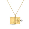Yellow and white gold necklace showing second and third page of book pendant on a white white background