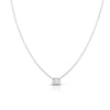 The Roberto Coin DIAMONDS BY THE INCH EMERALD CUT NECKLACE features a delicate silver chain and a small, square pendant with a clear gemstone at its center, shown on a white background.