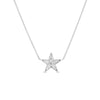 The Roberto Coin TINY TREASURES DIAMOND FIVE POINT STAR NECKLACE features a delicate 18K white gold chain with a diamond-encrusted star pendant, displayed on a white background—ideal for fans of minimalist jewelry.