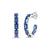 White gold open back hoop earrings with blue sapphires on a white background