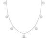 The Roberto Coin DIAMONDS BY THE INCH DANGLING SEVEN STATION NECKLACE features seven round bezel-set diamonds suspended along an 18K gold chain, highlighting exquisite Italian craftsmanship against a plain white background.
