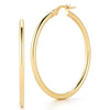 Pair of yellow gold hoop earrings with click down clasps on a white background