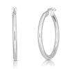 Two views of Roberto Coin’s THE PERFECT HOOP® SMALL EARRINGS, featuring a sleek, polished finish and simple latch clasp, are shown from the side and front on a white background—ideal for effortless everyday style.