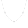 White gold necklace with three diamond flower stations on a white background
