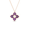 The Roberto Coin Venetian Princess Diamond and Titanium Small Flower Necklace showcases a four-petal flower pendant with purple accents, diamond details, and a textured gold edge on a fine gold chain.