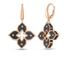 Four-petal flower drop earrings with black enamel petals, white diamond accents, and rose gold twisted borders with lever bac