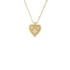 The VENETIAN PRINCESS SMALL HEART MEDALLION NECKLACE by Roberto Coin features a textured 18K yellow gold heart pendant with five central diamonds, highlighting exquisite Italian craftsmanship on a delicate gold chain.