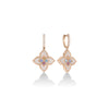 The VENETIAN PRINCESS CARNIVAL PAVE DIAMOND AND MIXED STONES FLOWER DROP EARRINGS by Roberto Coin feature gold floral shapes, pastel gemstones, and central diamonds, shown against a white background with a soft reflection beneath.