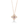 Rose gold diamond flower necklace with blue topaz, citrine, rubellite, and tanzanite accents on a white background