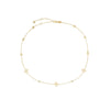 The Roberto Coin PRINCIPESSA DIAMOND AND FLOWER STATION NECKLACE features delicate gold with small floral motifs and round links, secured with a lobster clasp—a timeless piece for any occasion.