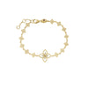 The Roberto Coin PRINCIPESSA FLOWER CHAIN AND DIAMOND FLOWER CHARM BRACELET features elegant floral motifs linked together, a central diamond flower charm, and an adjustable clasp—perfect for those who love refined flower jewelry.