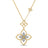 Yellow gold open frame double flower necklace with pave diamond accents on a white background