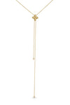 Yellow and gold lariat necklace with flower pendant and diamond accents ends on a white background