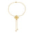 Yellow and gold bracelet with flower charm and diamond accents ends on a white background