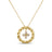 Yellow gold necklace with twist circle and dangling diamond flower pendant on a white background