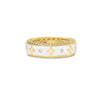 Front view of yellow gold and white enamel ring with diamond accents on a white background