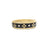 Front view of yellow gold and black enamel ring with diamond accents on a white background