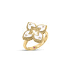 Side view of yellow gold and white enamel flower ring with diamond accents on a white background