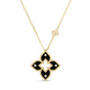 Yellow gold and black enamel flower necklace with diamond accents on a white background