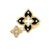 Front view of yellow gold and black enamel double flower ring with diamond accents on a white background