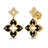 Yellow gold and black enamel double flower dangle earrings with diamond accents on a white background