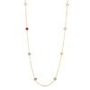 Yellow gold long necklace with mixed colored stones flower stations on a white background