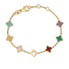 Yellow gold bracelet with mixed colored stones flower stations on a white background