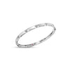 White gold bangle with diamond floral motif accents on a white background