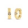 Yellow gold hoop earrings with diamond floral motif accent on a white background