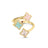 Front view of yellow gold three flower ring with amazonite, mother of pearl, and pink opal on a white background