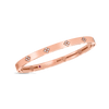 The Roberto Coin LOVE IN VERONA NARROW WIDTH DIAMOND ACCENT BANGLE in rose gold features small flower-shaped diamond clusters spaced around the band, ideal for stacking, shown on a plain white background.