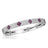 White gold bangle bracelet with a pave diamond finish and ruby accents on a white background