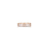 Rose gold ring with diamonds on a white background