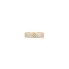 Yellow gold ring with diamonds on a white background