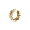 The DOMINO PAVE RING by Roberto Coin is a modern 18K yellow gold spiral ring with alternating smooth and pavé diamond-studded cylindrical segments, shown on a white background.