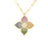 The Roberto Coin Venetian Princess Diamond and Mixed Sapphire Flower Long Necklace features an 18K yellow gold chain with a bold flower pendant adorned with colorful sapphires and diamonds.