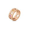 The NAVARRA DIAMOND AND MIXED SAPPHIRE RING by Roberto Coin features star-shaped cutouts, sparkling round diamonds, and bold yellow and pink square sapphires—a striking, modern rose gold piece with unique detailing.