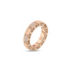 The ART DECO MOSAIC ALTERNATING DIAMOND RING by Roberto Coin is crafted in 18K rose gold with a textured band, set with sparkling white diamonds and featuring a hidden red gemstone, displayed on a white background.